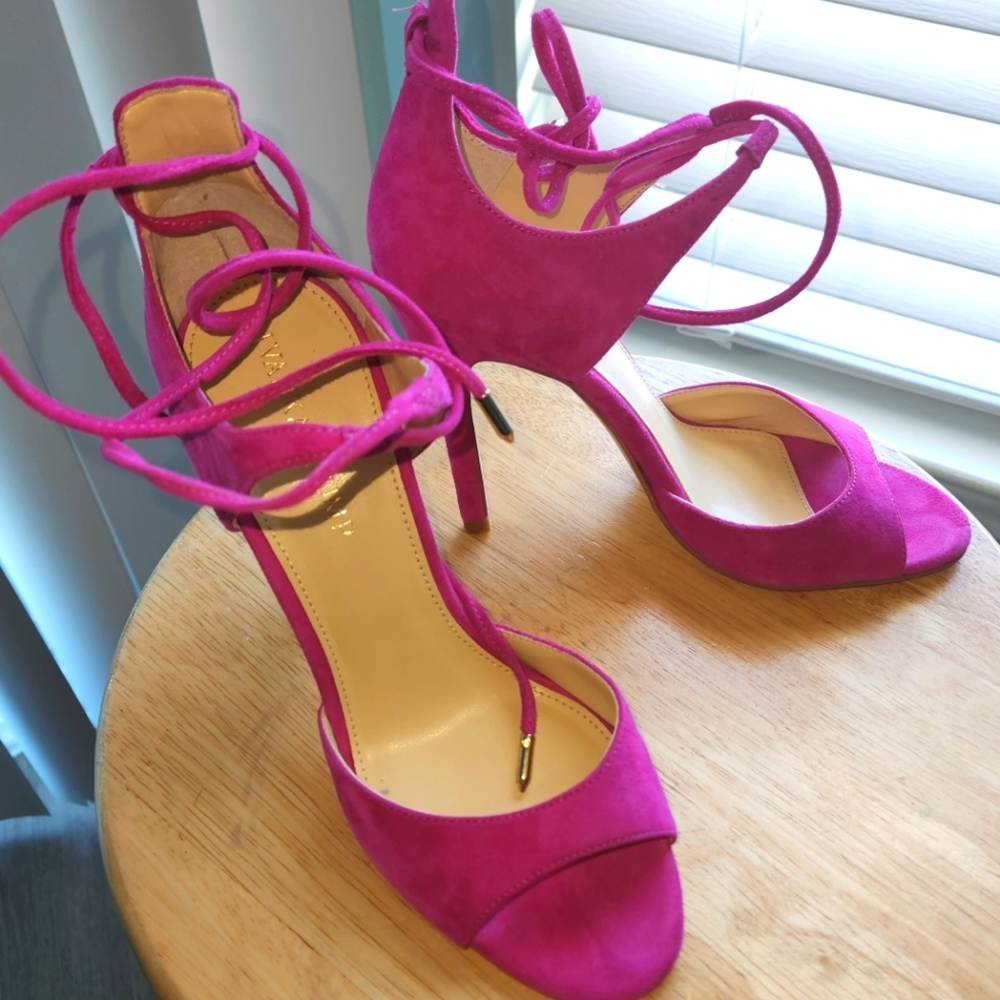 Pink tie around ankle heels